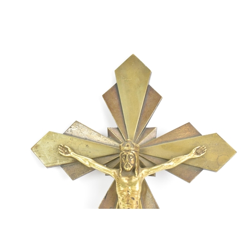 112 - An Art Deco gilt metal crucifix, cast with Christ, signed to the reverse 'E Hoffer' and numbered 5.4... 