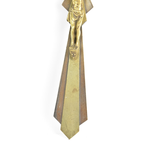 112 - An Art Deco gilt metal crucifix, cast with Christ, signed to the reverse 'E Hoffer' and numbered 5.4... 