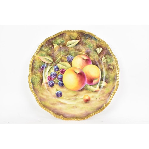 115 - A Royal Worcester fruit decorated cabinet plate, of shaped circular form, hand painted with still li... 