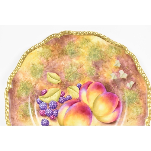 116 - A Royal Worcester fruit decorated cabinet plate, of shaped circular form, hand painted with still li... 