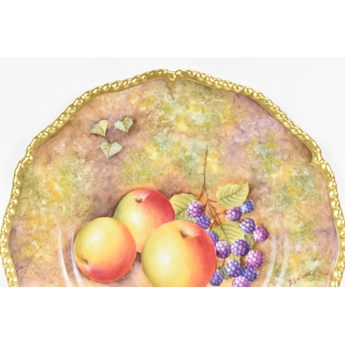 117 - A Royal Worcester fruit decorated cabinet plate, of shaped circular form, hand painted with still li... 