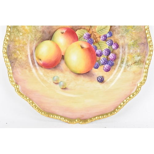 117 - A Royal Worcester fruit decorated cabinet plate, of shaped circular form, hand painted with still li... 