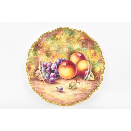 119 - A Royal Worcester fruit decorated cabinet plate, of shaped circular form, hand painted with still li... 