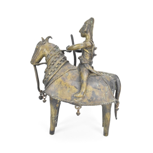 12 - A late 19th century Indian bronze horse and rider, the figure fashioned as a warrior with a shield s... 