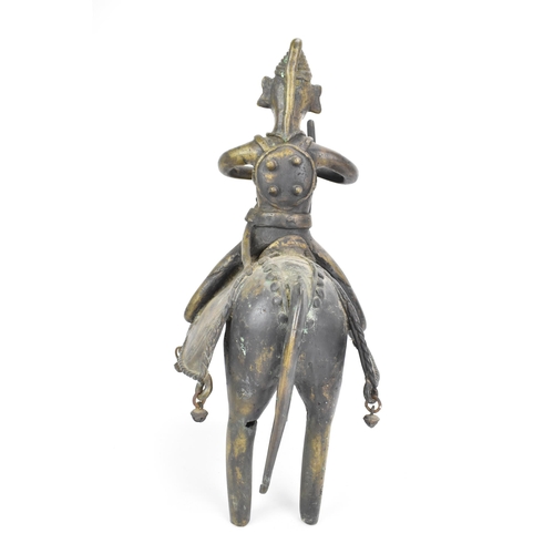 12 - A late 19th century Indian bronze horse and rider, the figure fashioned as a warrior with a shield s... 