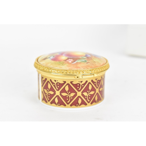 122 - A Royal Worcester fruit decorated trinket box entitled 'Peaches' having a hinged lid panted with fru... 