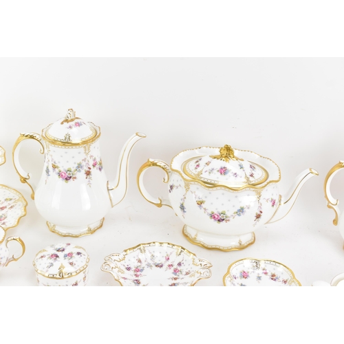 123 - A Royal Crown Derby Antoinette pattern tea and coffee service to include a hot water pot, tea pot, c... 