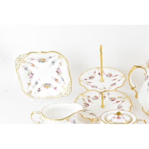 123 - A Royal Crown Derby Antoinette pattern tea and coffee service to include a hot water pot, tea pot, c... 