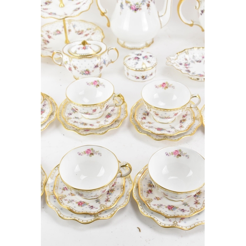 123 - A Royal Crown Derby Antoinette pattern tea and coffee service to include a hot water pot, tea pot, c... 