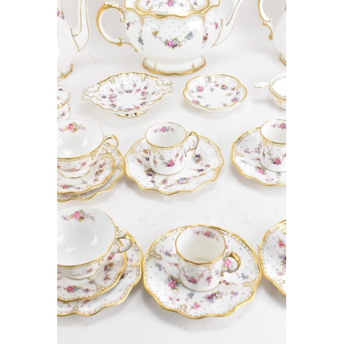 123 - A Royal Crown Derby Antoinette pattern tea and coffee service to include a hot water pot, tea pot, c... 