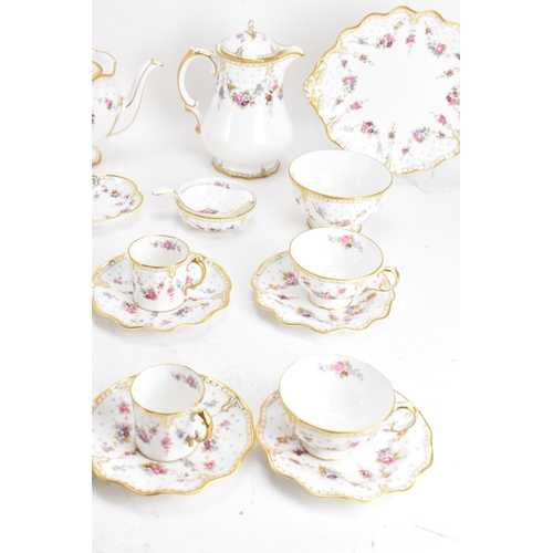 123 - A Royal Crown Derby Antoinette pattern tea and coffee service to include a hot water pot, tea pot, c... 