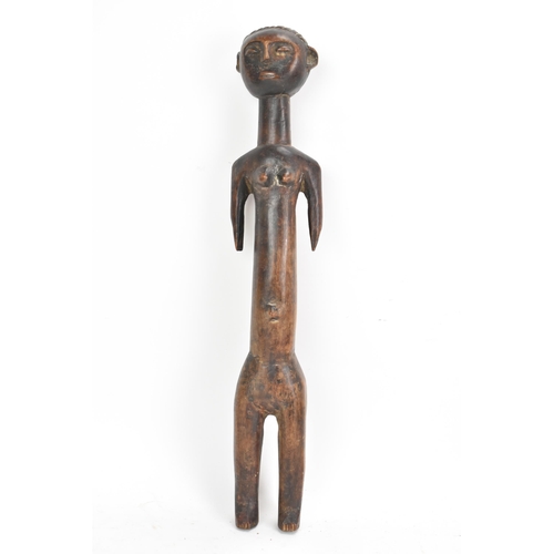 124 - Ethnographic Tribal Art - An African tribal carving of a female fertility figure, of standing form a... 