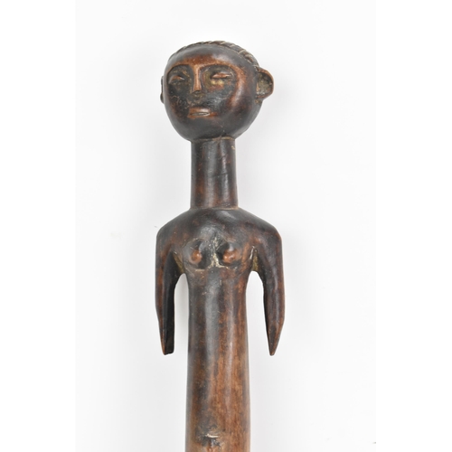 124 - Ethnographic Tribal Art - An African tribal carving of a female fertility figure, of standing form a... 