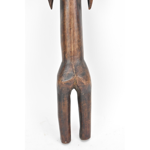 124 - Ethnographic Tribal Art - An African tribal carving of a female fertility figure, of standing form a... 