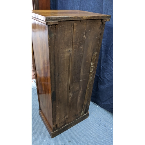 133 - A Victorian walnut wellington chest, having six graduated drawers with bun shaped handles, two side ... 