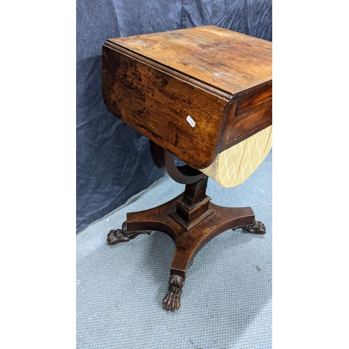 144 - A William IV rosewood sewing table, having two fall flaps, two drawers above a sewing basket, waiste... 