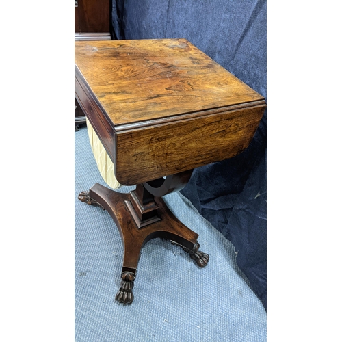 144 - A William IV rosewood sewing table, having two fall flaps, two drawers above a sewing basket, waiste... 