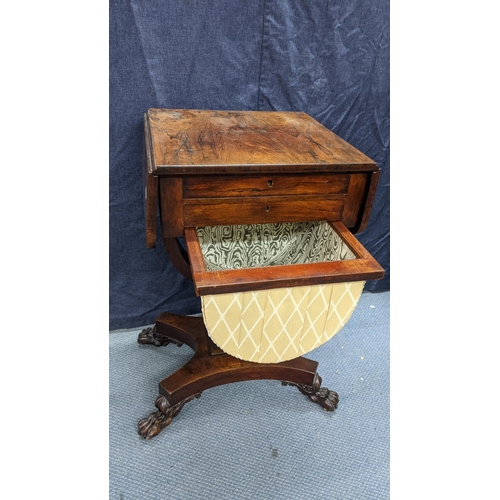 144 - A William IV rosewood sewing table, having two fall flaps, two drawers above a sewing basket, waiste... 