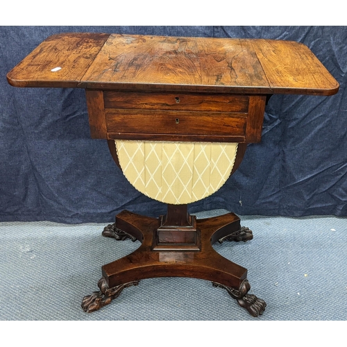 144 - A William IV rosewood sewing table, having two fall flaps, two drawers above a sewing basket, waiste... 