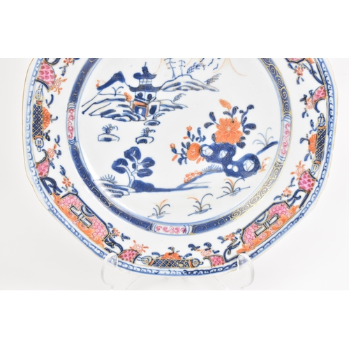 2 - A pair of Chinese export Imari Famille Rose dishes, Qianlong, mid 18th century, each having landscap... 