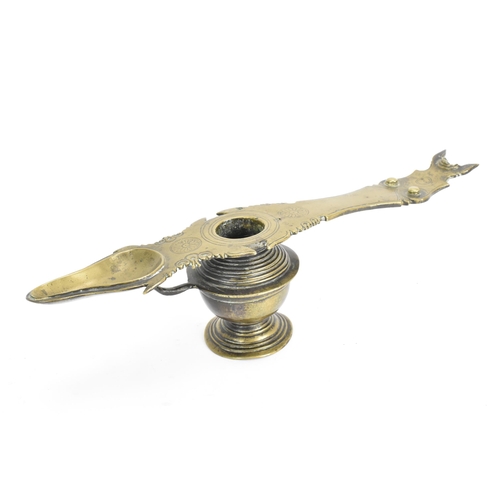 22 - A late 19th/early 20th century Kerala, South Indian brass oil lamp, having a flared circular foot, d... 