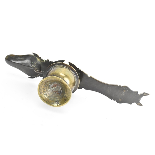 22 - A late 19th/early 20th century Kerala, South Indian brass oil lamp, having a flared circular foot, d... 