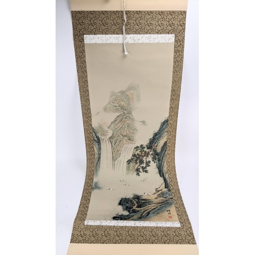 24 - Three 20th century Chinese scroll paintings to include one depicting cranes in a mountain landscape ... 