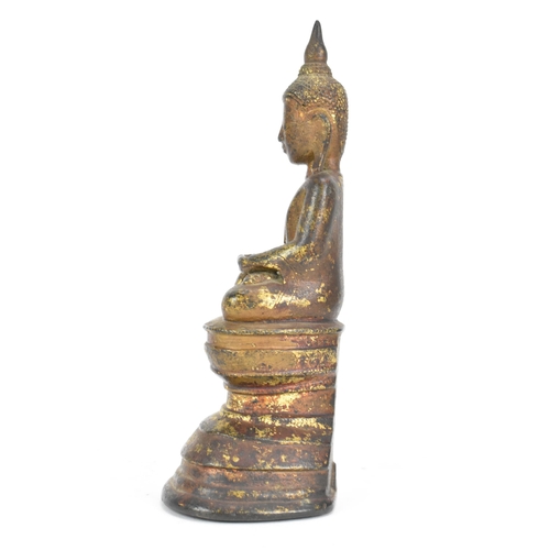 26 - A 18th/19th Century Bronze Buddha, modelled seated in varada mudra on a lotus throne, 19cm x 8.5cm w... 