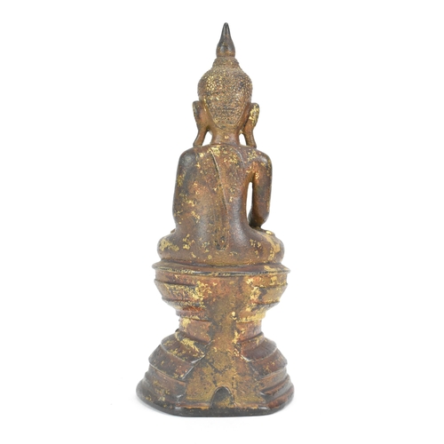 26 - A 18th/19th Century Bronze Buddha, modelled seated in varada mudra on a lotus throne, 19cm x 8.5cm w... 