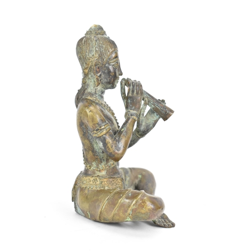 27 - A Thai bronze statue of a Buddha, in a seated cross legged position playing a musical instrument, 14... 