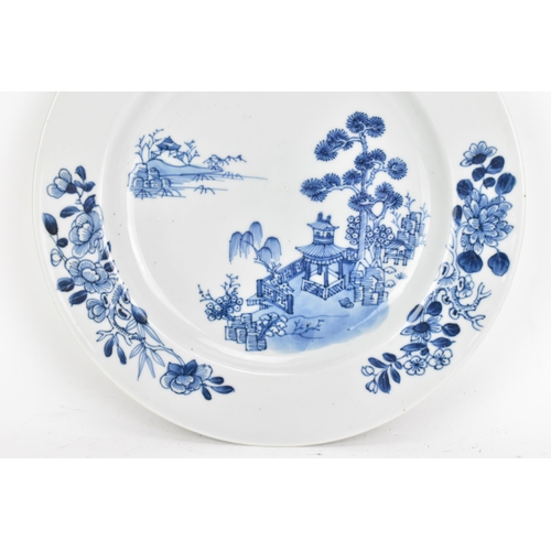 33 - A Chinese 18th century, Qianlong, Nanking Cargo plate, decorated in blue on white depicting a river ... 