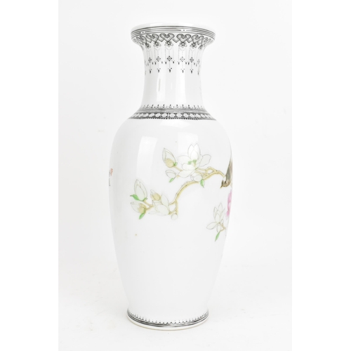 41 - A Chinese Repubic period famille rose vase, painted with a bird perched on blossoming peonies, inscr... 