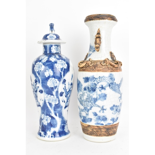 43 - Two Chinese Qing dynasty vases, late 19th century, to include a blue and white baluster lidded vase ... 