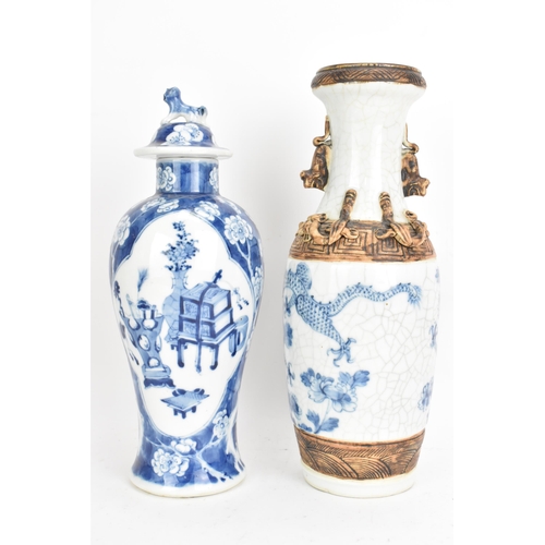 43 - Two Chinese Qing dynasty vases, late 19th century, to include a blue and white baluster lidded vase ... 