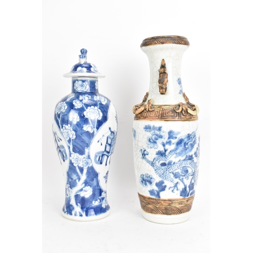 43 - Two Chinese Qing dynasty vases, late 19th century, to include a blue and white baluster lidded vase ... 