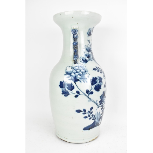 55 - A Chinese Qing dynasty large twin handled vase, late 19th century, decorated with a phoenix perched ... 