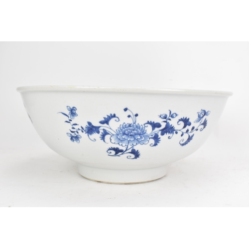 56 - A Chinese export Qing dynasty blue and white punch bowl, late 18th century, the interior painted wit... 