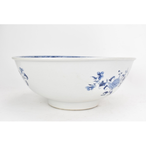 56 - A Chinese export Qing dynasty blue and white punch bowl, late 18th century, the interior painted wit... 