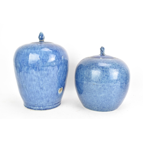 57 - Two Chinese 20th century powder blue glazed ginger jars and lids, one of ovoid form and having a foo... 