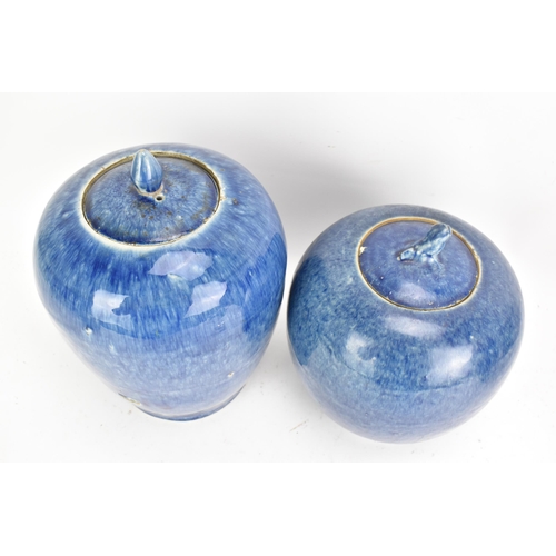 57 - Two Chinese 20th century powder blue glazed ginger jars and lids, one of ovoid form and having a foo... 