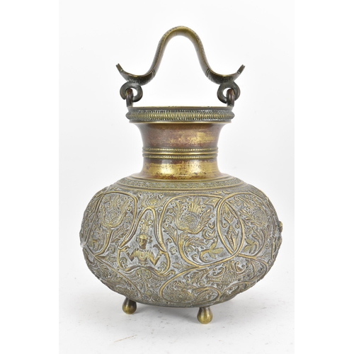 71 - A late 19th/early 20th century Sri Lankan Batavian brass ceremonial vessel, with snake form handle, ... 