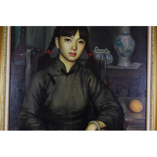 78 - Chinese school - A large 20th century oil on canvas depicting a portrait of a young woman, seated on... 