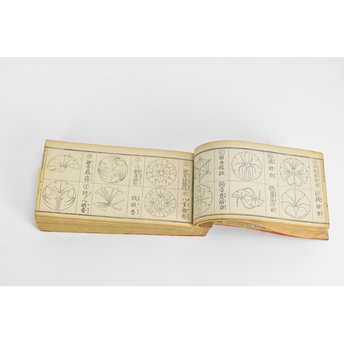 8 - A late Meiji period century Japanese book entitled 'The Illustrated Book Of All Crests', Mon Zukushi... 