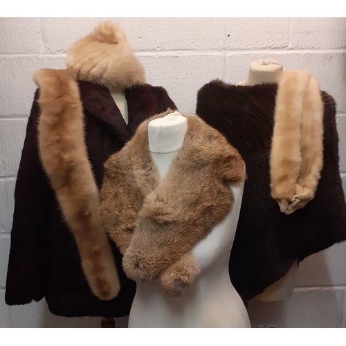 105 - A group of fur clothing comprising a wolf collar, a blonde mink collar, a blonde mink stole with 2 m... 