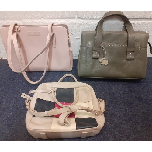 29 - Radley- Three leather bags in various colours and designs, hardly used, together with an un-used bla... 