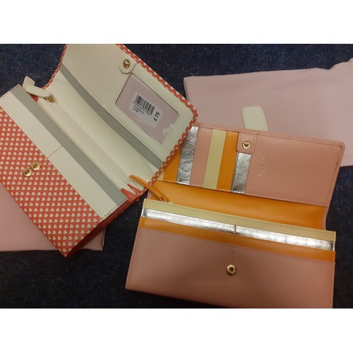 27 - Radley- Two unused leather purses in different designs with branded dust-bags. Location:R2.3
Conditi... 