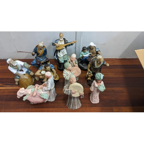 280 - A small collection of Shiwan figurines to include fishermen, musicians and others Location:5-2
If th... 