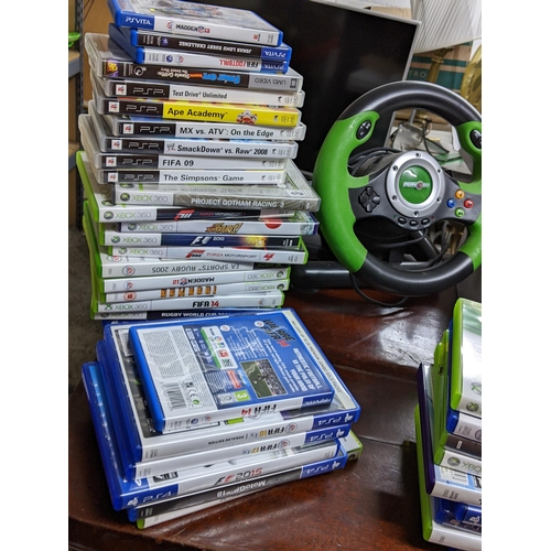 172 - Gaming related items to include XBox in clear plastic casing, XBox 360, games PSP Go, Wii and an X R... 