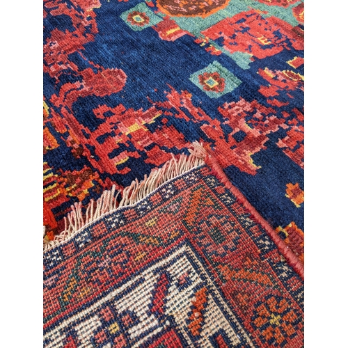 176 - A Kurdish West Iranian rug with geometric floral motifs 136cm x210cm
Location: LAB
If there is no co... 