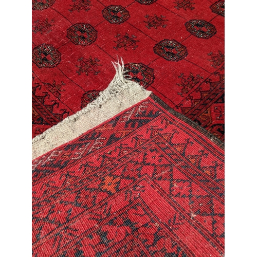 181 - An Afghanistan Turkoman rug with repeated gulls on a red ground 155cms x 233cms
Location: G
If there... 